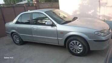 мазда кронус: Mazda 323: 2001 г., 1.6 л, Механика, Бензин, Седан — 6