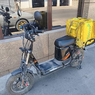 Скутеры: Электроскутер для курьерской доставки Описание: - Компактный — 1