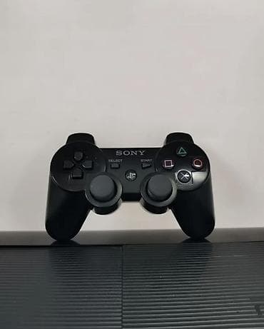 диск караоке: Игровая приставка Sony PlayStation 3 Super Slim (чёрная) — 1
