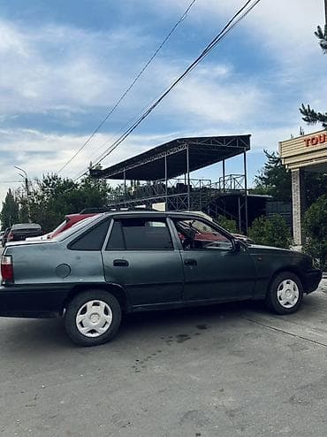 Daewoo Nexia: 2005 г., Механика, Бензин, Седан