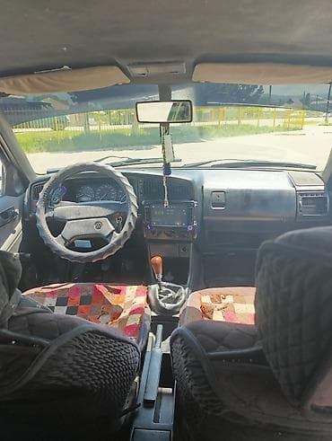 Унаа: Volkswagen Passat: 1989 г., 1.8 л, Кол менен иштөөчү, Бензин, Седан — 7