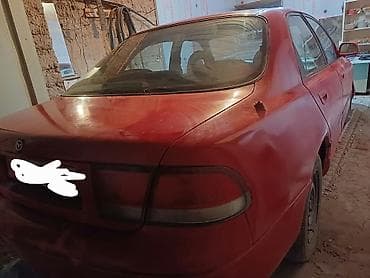 Транспорт: Mazda 626: 1994 г., 2 л, Механика, Бензин, Седан — 4