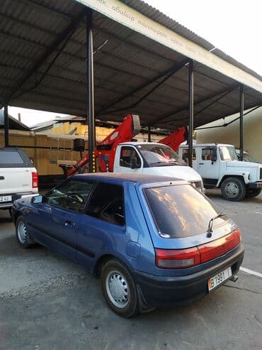 Mazda 323: 1991 г., Механика, Хэтчбэк