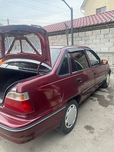 кен булун: Daewoo Nexia: 2004 г., Седан — 6