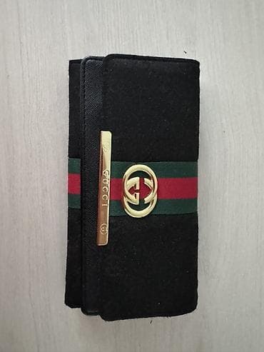 Женский кошелёк-купюрник Gucci - Материал: чёрная фактурная кожа — 1