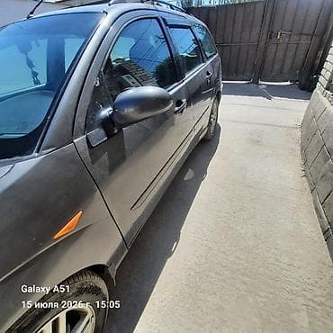 вмятина: Ford Focus: 2002 г., 2 л, Механика, Бензин, Универсал — 4