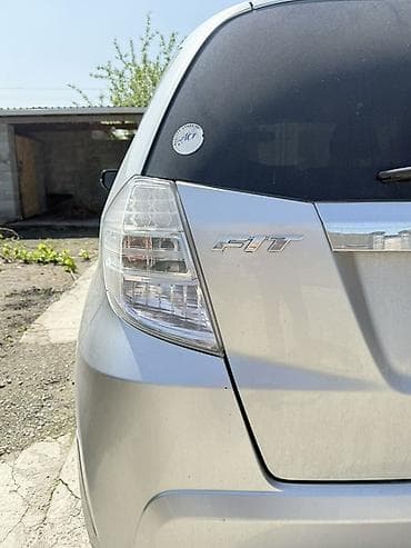 zimmer e9 pro: Honda Fit: 2011 г., 1.3 л, Вариатор, Гибрид, Хэтчбэк — 6