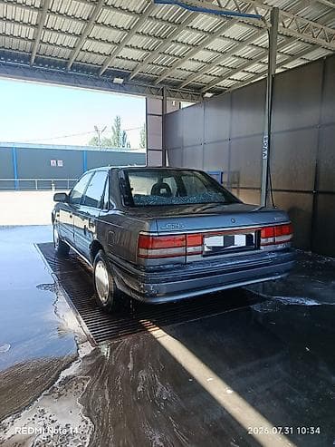 Транспорт: Mazda 626: 1990 г., 2 л, Механика, Бензин, Седан — 6