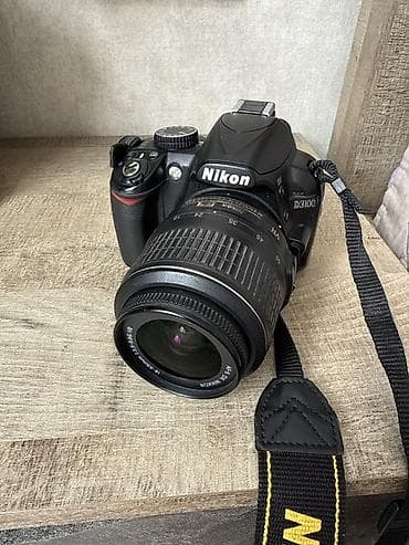 Зеркальная камера Nikon D3100 с объективом AF‑S DX NIKKOR 18–55mm