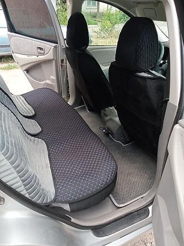 lync co: Nissan Almera Tino: 2001 г., 1.8 л, Механика, Газ, Минивэн — 6