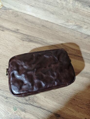 купить золотые серьги с жемчугом: Сумка клатч
Натуральная кожа — 5