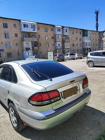 s class w220: Mazda 626: 1999 г., 1.8 л, Механика, Бензин, Хэтчбэк — 5
