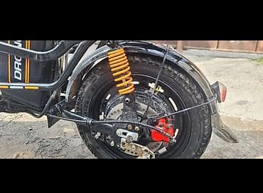 амартизатор: Электроскутер DRONGO (электровелосипед-самокат) - Питание — 6