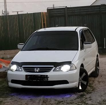323 ф: Honda Odyssey: 2002 г., Бензин — 4