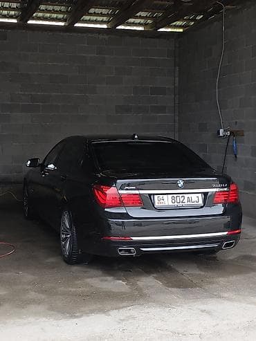 протер 2: BMW 750LI: 2013 г., 4.4 л, Автомат, Бензин, Седан — 2