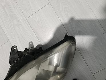 mazda 2: Комплект передних фар Peugeot — 7