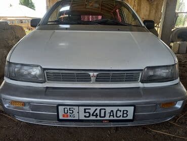 доставка аккумулятора бишкек: Просторный минивэн белого цвета с рейлингами на крыше — 5