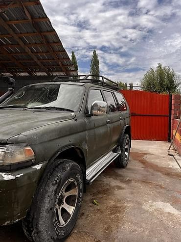 дамкрат авто: Mitsubishi Montero Sport: 1997 г., 3 л, Автомат, Газ, Внедорожник — 4