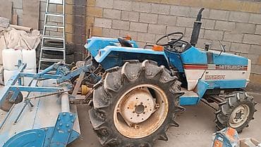 Mitsubishi MT2501 — компактный универсальный трактор с навесным