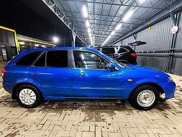 мазда 6 унверсал: Mazda Familia: 2001 г., 1.6 л, Механика, Хэтчбэк — 10