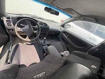 Mitsubishi Colt: 1999 г., Кол менен иштөөчү, Бензин, Хетчбек