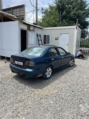 Транспорт: Nissan Primera: 1999 г., Автомат, Бензин, Седан — 3