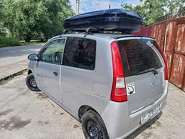 дайхатсу куеро: Daihatsu Cuore: 2005 г., 1 л, Механика, Бензин, Купе — 5