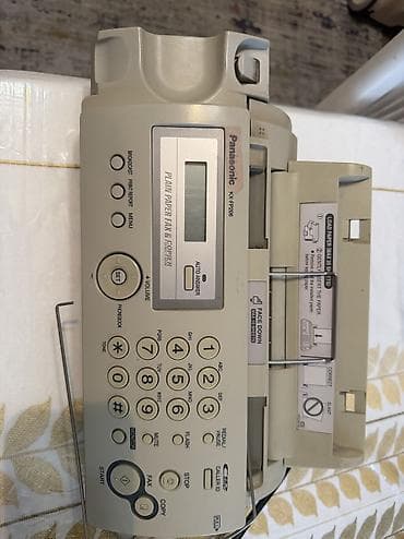 Факс-телефон Panasonic KX-FP206 (plain paper fax & copier) -