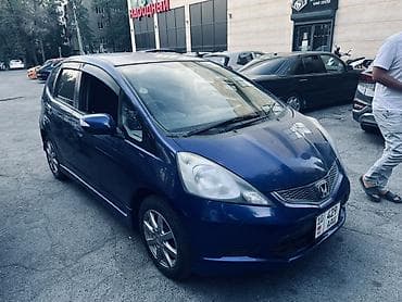 мото мини: Honda Fit: 2009 г., 1.5 л, Автомат, Бензин, Хэтчбэк — 2