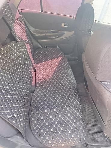 Mazda 323: 2002 г., 1.6 л, Механика, Бензин, Универсал — 4