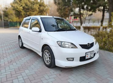 электрическое авто: Mazda Demio: 2003 г., 1.5 л, Автомат, Бензин, Хэтчбэк — 1