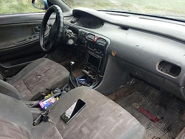 капот солярис: Mazda 626: 1992 г., Седан — 5
