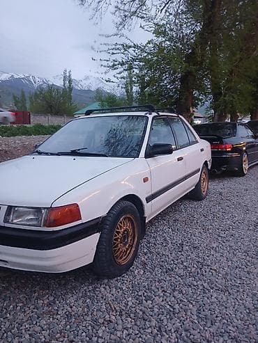 лобовое стекло мазда: Mazda 323: 1989 г., Седан — 1