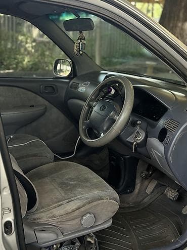 корзина на мтз: Toyota Raum: 1998 г., 1.5 л, Автомат, Бензин, Минивэн — 7