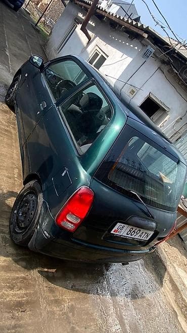 сдам машину под выкуп: Daihatsu Cuore: 2001 г., 1 л, Автомат, Бензин, Купе — 4