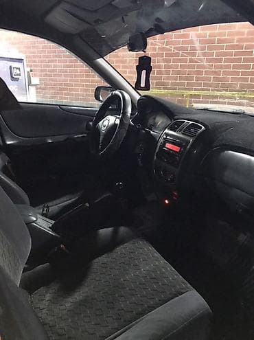 bmw e34 1995: Mazda Familia: 2001 г., Универсал — 9