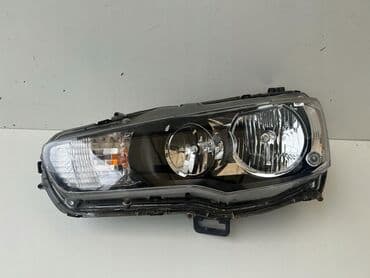 купить фары на ниву: Передняя левая фара Mitsubishi 2008 г., Новый, Аналог — 1