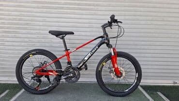 рейтинг детских велосипедов от 3 лет: Детский велосипед в синем цвете, оснащенный дополнительными боковыми — 15