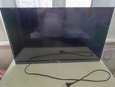 Телевизоры: Телевизор VASIN, диагональ примерно 32–40". Плоская LED‑панель, тонкие — 1