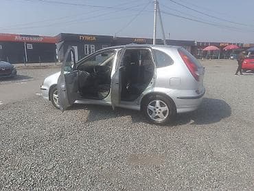 фары на е34: Nissan Almera Tino: 2001 г., 2 л, Автомат, Бензин, Минивэн — 5