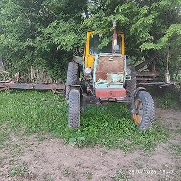 юмз куном: Трактор колесный (ориентировочно семейства ЮМЗ) с кабиной Описание: - — 3