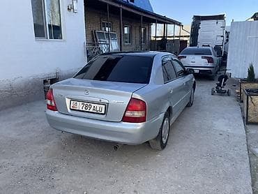 mazda 323 эфка: Mazda 323: 2003 г., 1.6 л, Бензин, Седан — 4