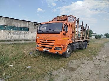 Продаю КамАЗ лесовоз спрыцепом 2013 года все вопросы по телефону цена