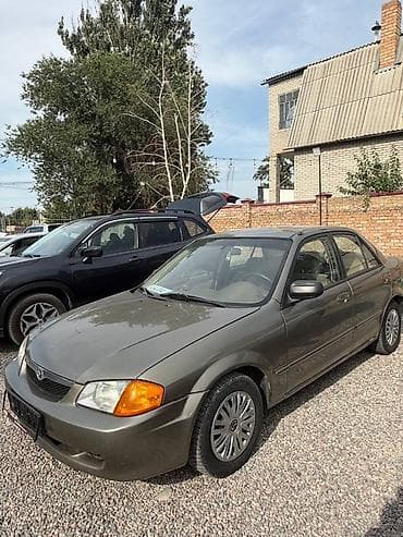 Продажа авто: Mazda Protege: 2000 г., 2 л, Автомат, Бензин, Седан — 6