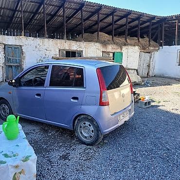 Продажа авто: Daihatsu Cuore: 2004 г., Хэтчбэк — 1