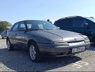 mazda protage: Mazda 323: 1993 г., 1.6 л, Ручные, Бензин, Седан — 1