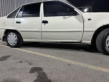 Daewoo Nexia: 2012 г., 1.5 л, Механика, Газ, Седан — 7