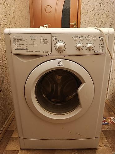 70: Стиральная машина Indesit IWSC 6105, фронтальная загрузка — 1