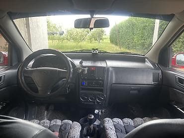ford fokus: Hyundai Getz: 2004 г., 1.4 л, Механика, Бензин, Хэтчбэк — 7