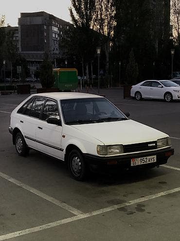 гц 8: Mazda 323: 1987 г., 1.5 л, Механика, Бензин, Хэтчбэк — 6